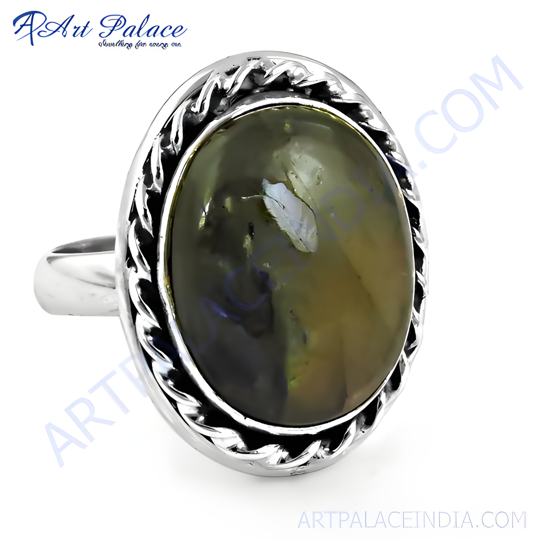 Sterling silver oval ring with a large black gemstone. Features a braided rope design around the stone.