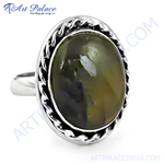 Load image into Gallery viewer, Sterling silver oval ring with a large black gemstone. Features a braided rope design around the stone.
