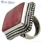 Load image into Gallery viewer, 925 sterling silver ring with a large pink rhodonite gemstone in a bezel setting
