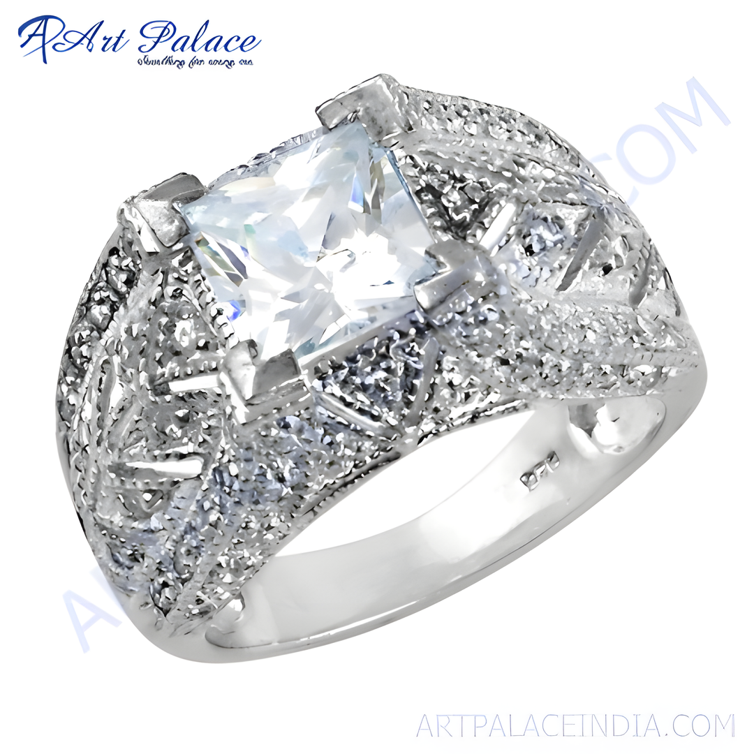 Sterling silver cocktail ring with large square cubic zirconia center stone and micro pave details.