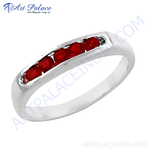 Load image into Gallery viewer, Sterling silver ring with five bright red rubies set in a row. A classic gemstone ring for women.

