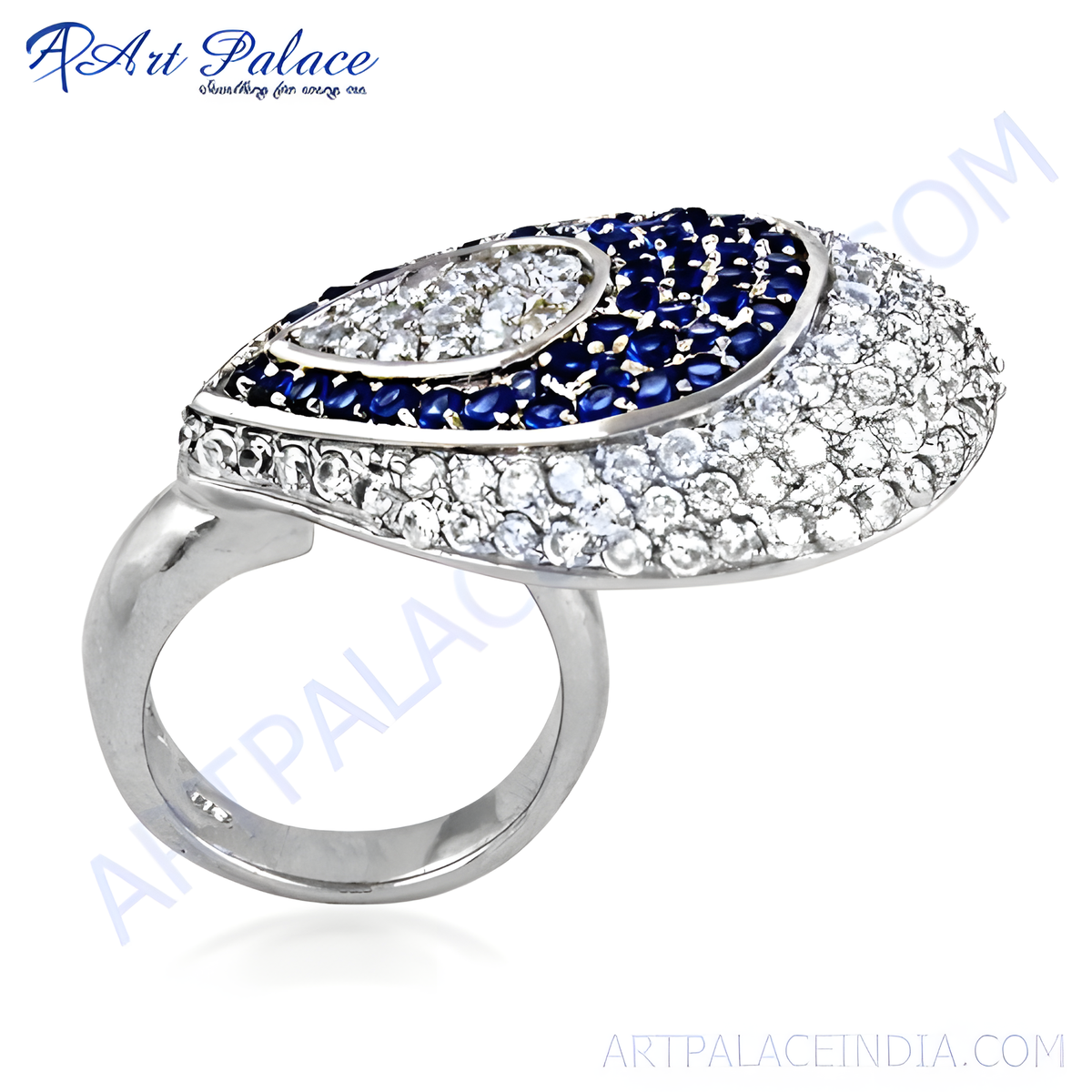 Silver cocktail ring with white diamonds and blue sapphire gemstones, a statement piece for women