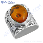 Load image into Gallery viewer, 925 sterling silver amber ring for men featuring a large oval gemstone.
