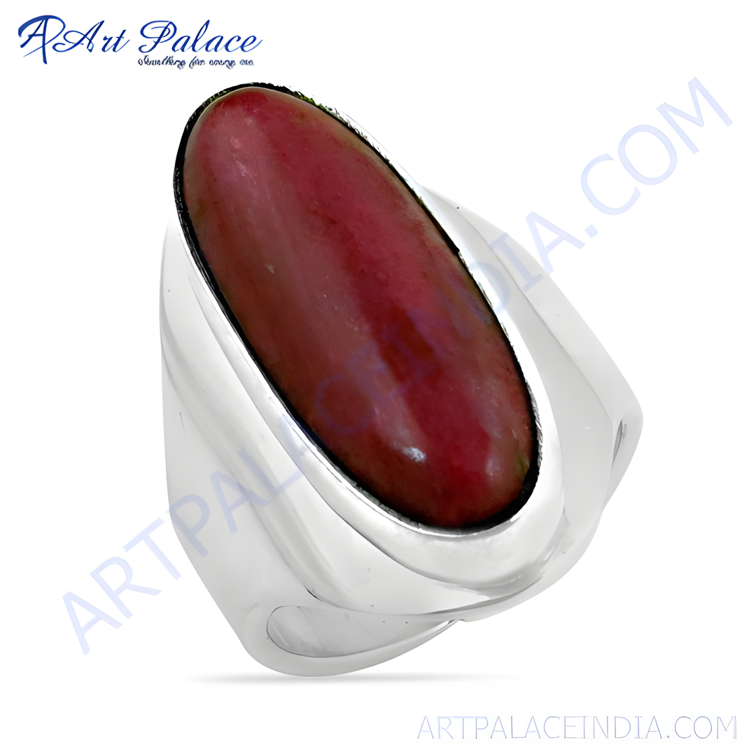 Silver ring with a large oval-cut red gemstone; perfect for women.