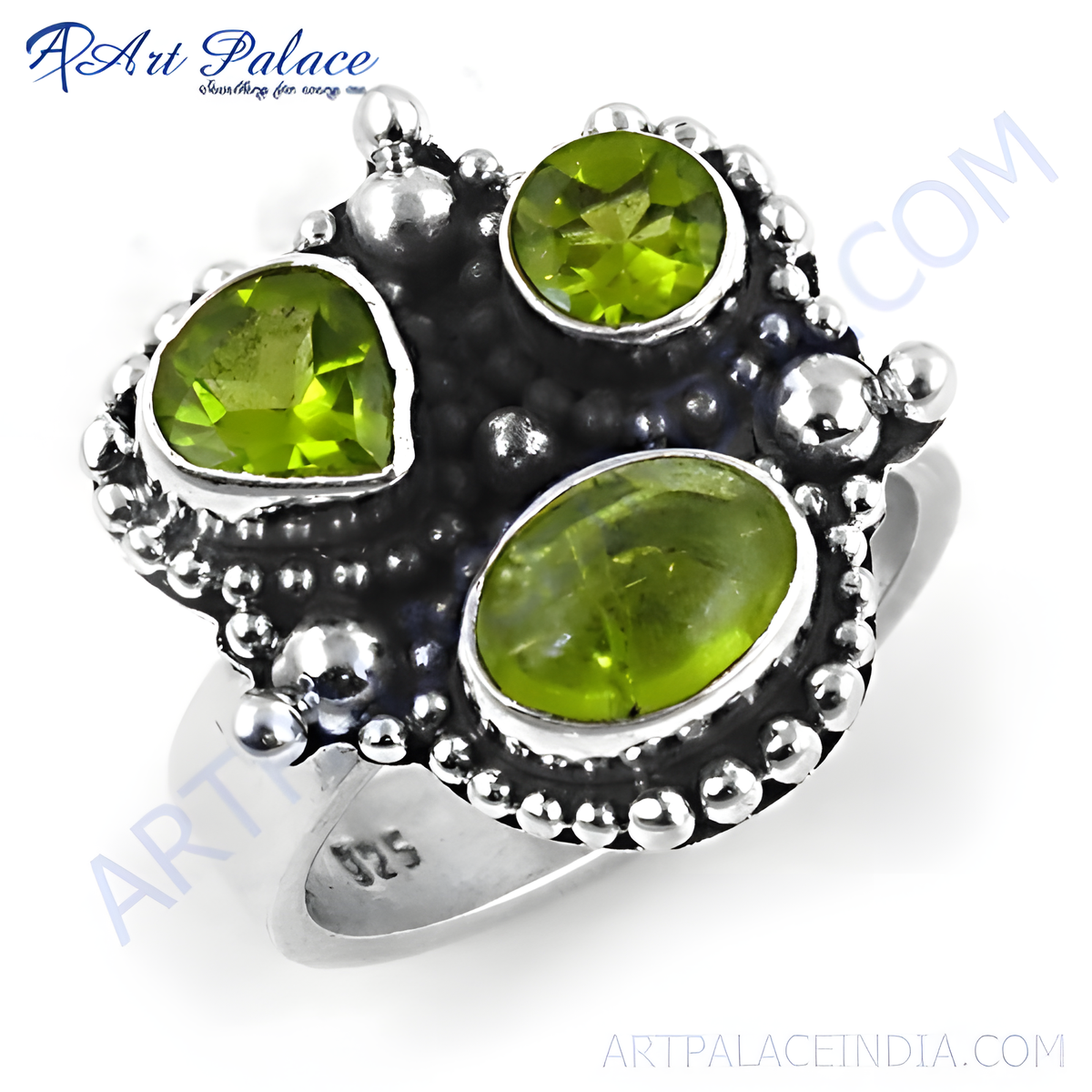 925 sterling silver ring with three peridot gemstones