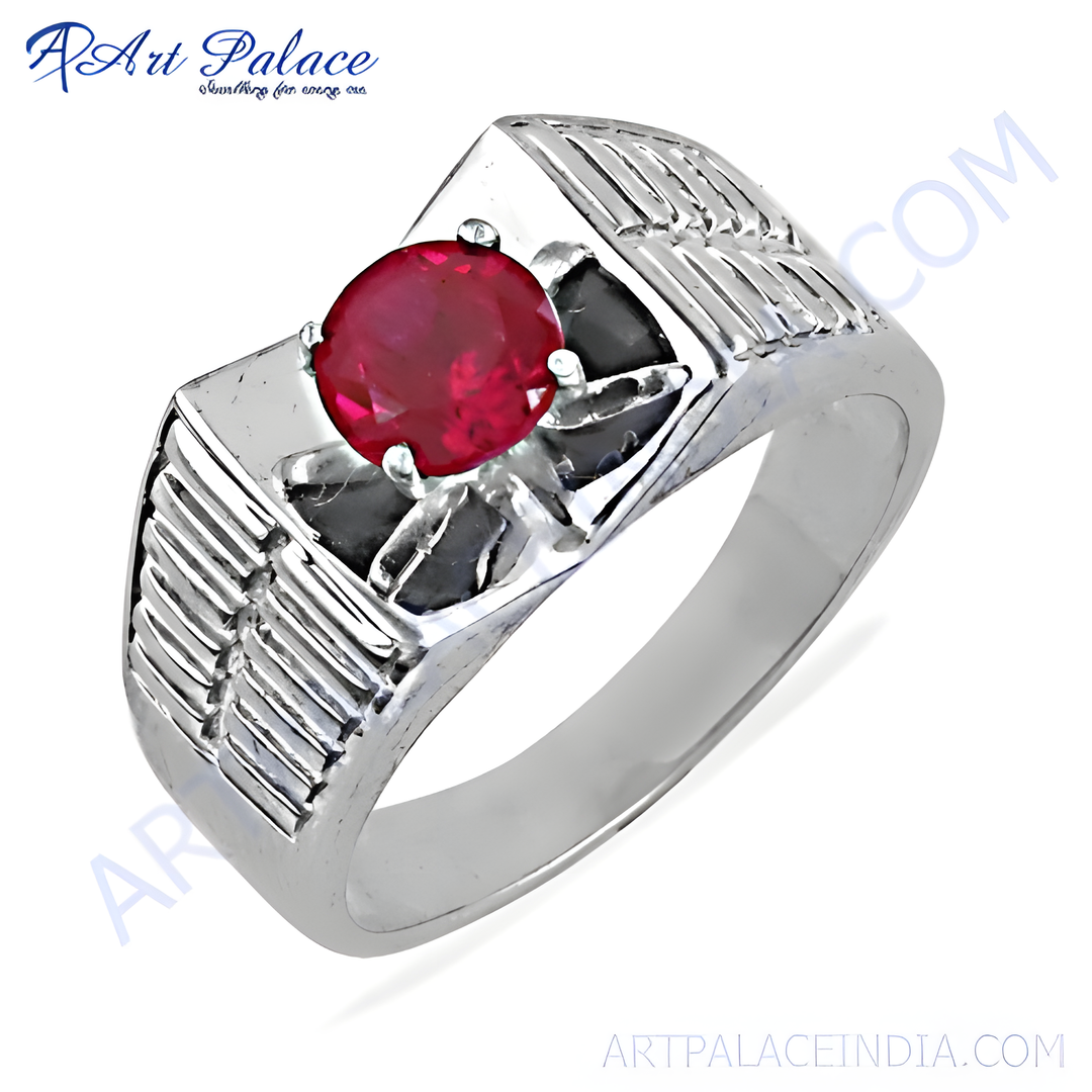 Sterling silver men's signet ring with a vibrant red ruby gemstone centerpiece.