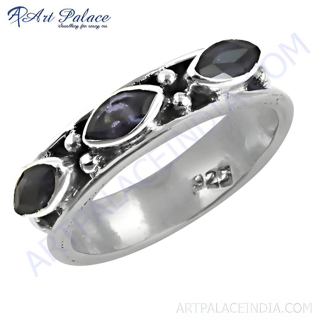 925 sterling silver ring with three black gemstones, showcasing a modern design.
