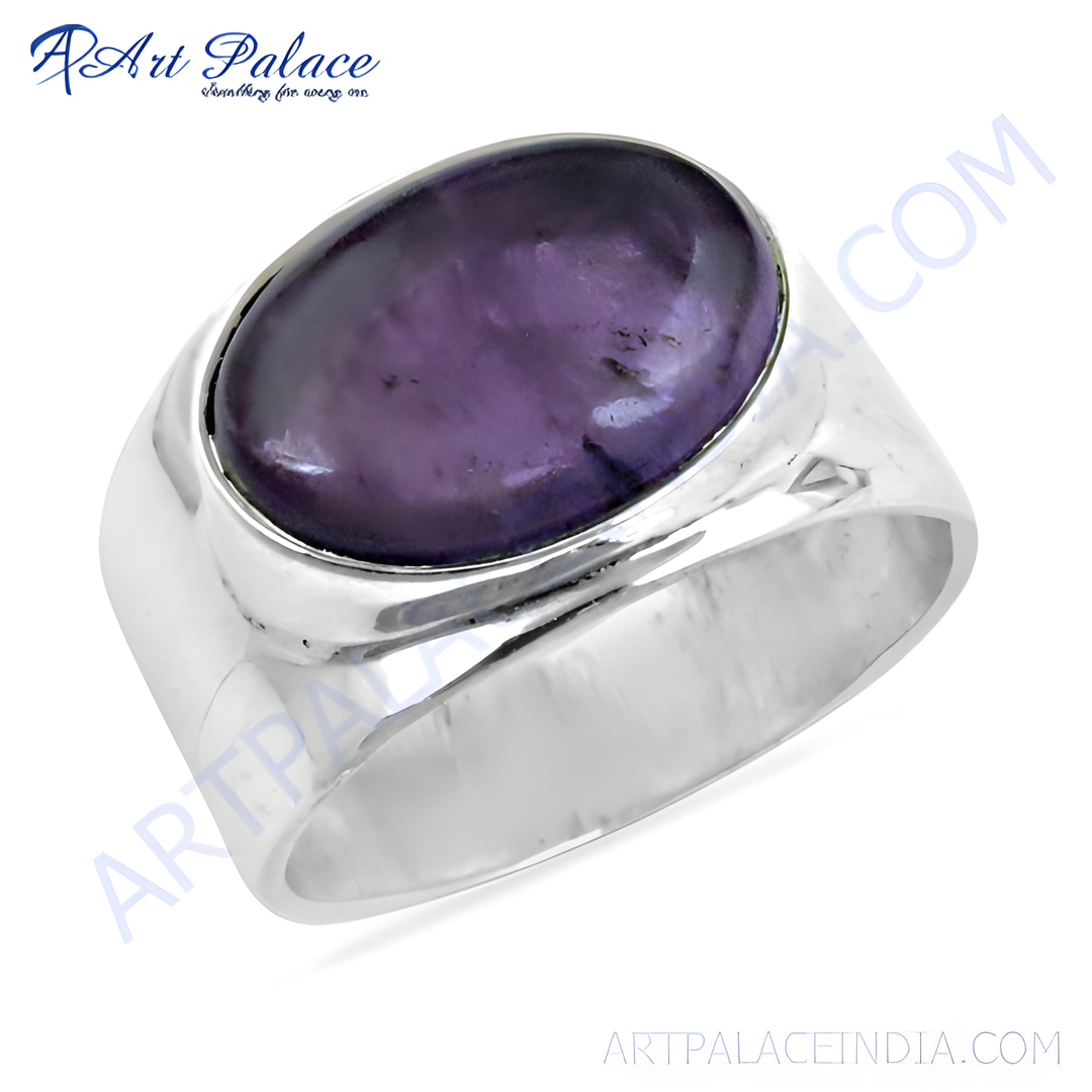 Sterling silver signet ring with a large oval-shaped purple gemstone set in a polished silver band.
