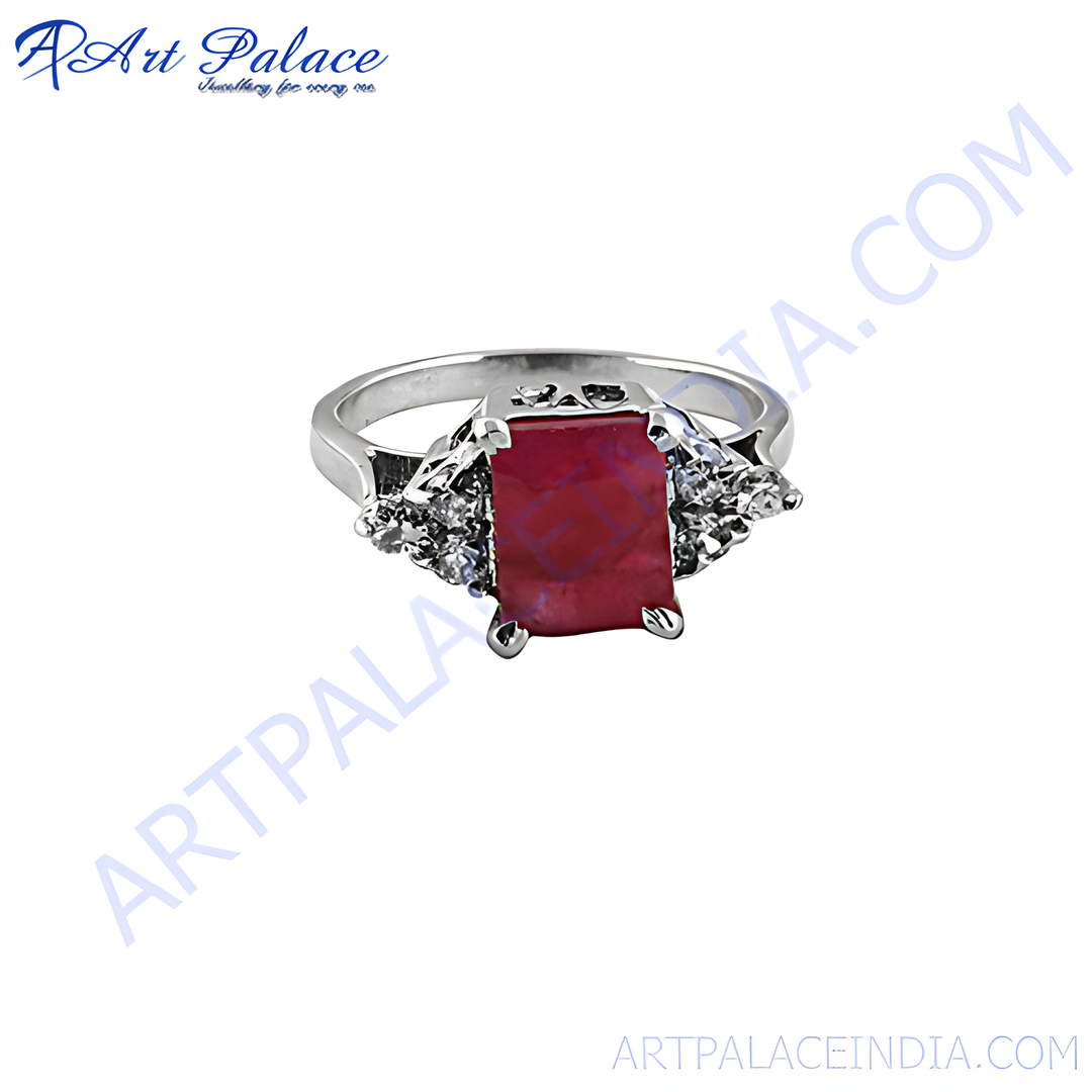 Silver ring with a large rectangular ruby gemstone and accent stones, perfect as a gift.