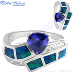 Load image into Gallery viewer, Sterling silver statement ring with triangle tanzanite center stone and blue opal accents
