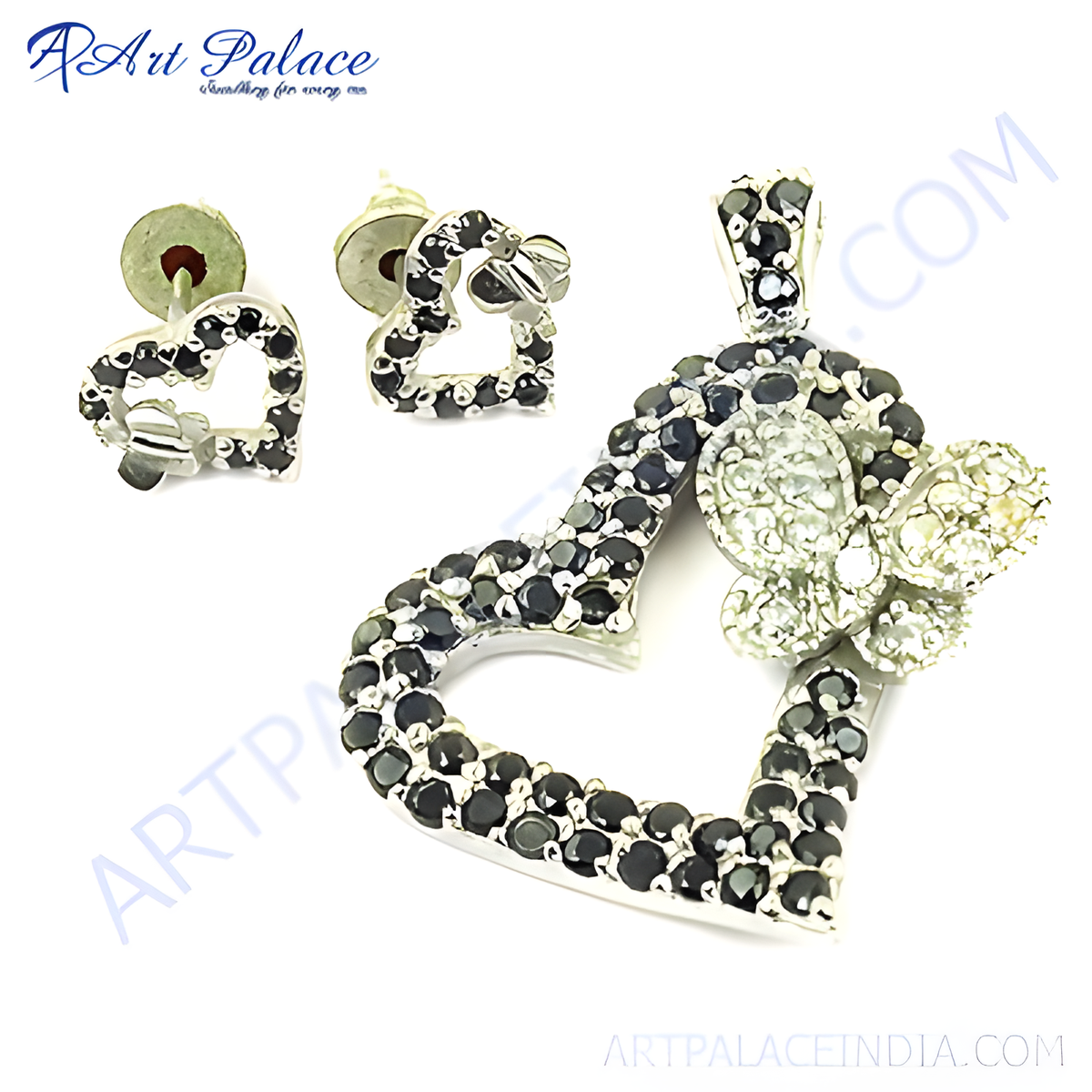 Sterling silver heart pendant and matching earrings set with black gemstones, ideal for women's fashion jewelry