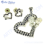 Load image into Gallery viewer, Sterling silver heart pendant and matching earrings set with black gemstones, ideal for women&#39;s fashion jewelry.
