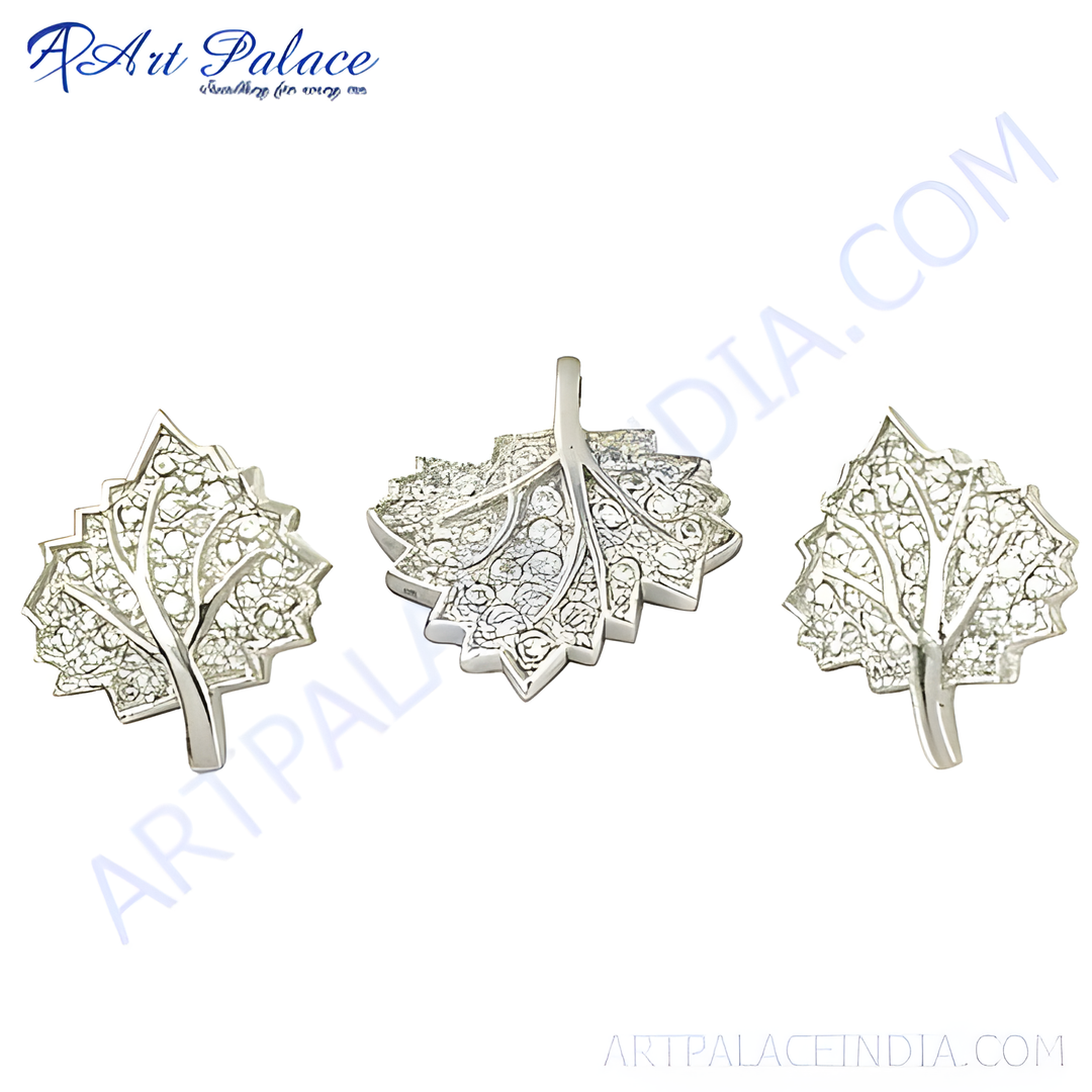 Silver leaf pendant and earrings set with sparkling cubic zirconia stones, perfect for adding a touch of natural beauty to any outfit.