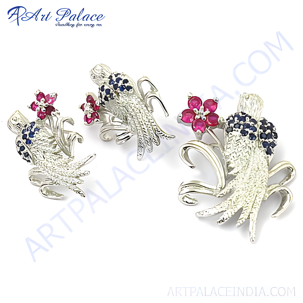 Silver floral stud earrings with ruby and sapphire gemstones
