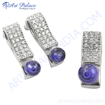 Load image into Gallery viewer, Silver drop earrings with sparkling crystals and a vibrant purple gemstone. Elegant and stylish earrings.
