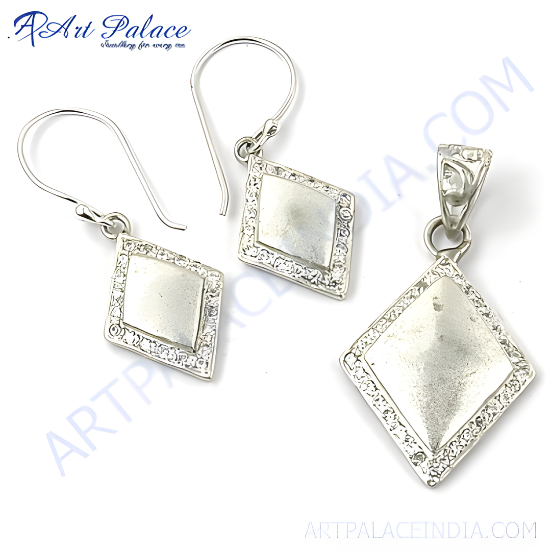 925 sterling silver diamond shape pendant and earring set on white background.
