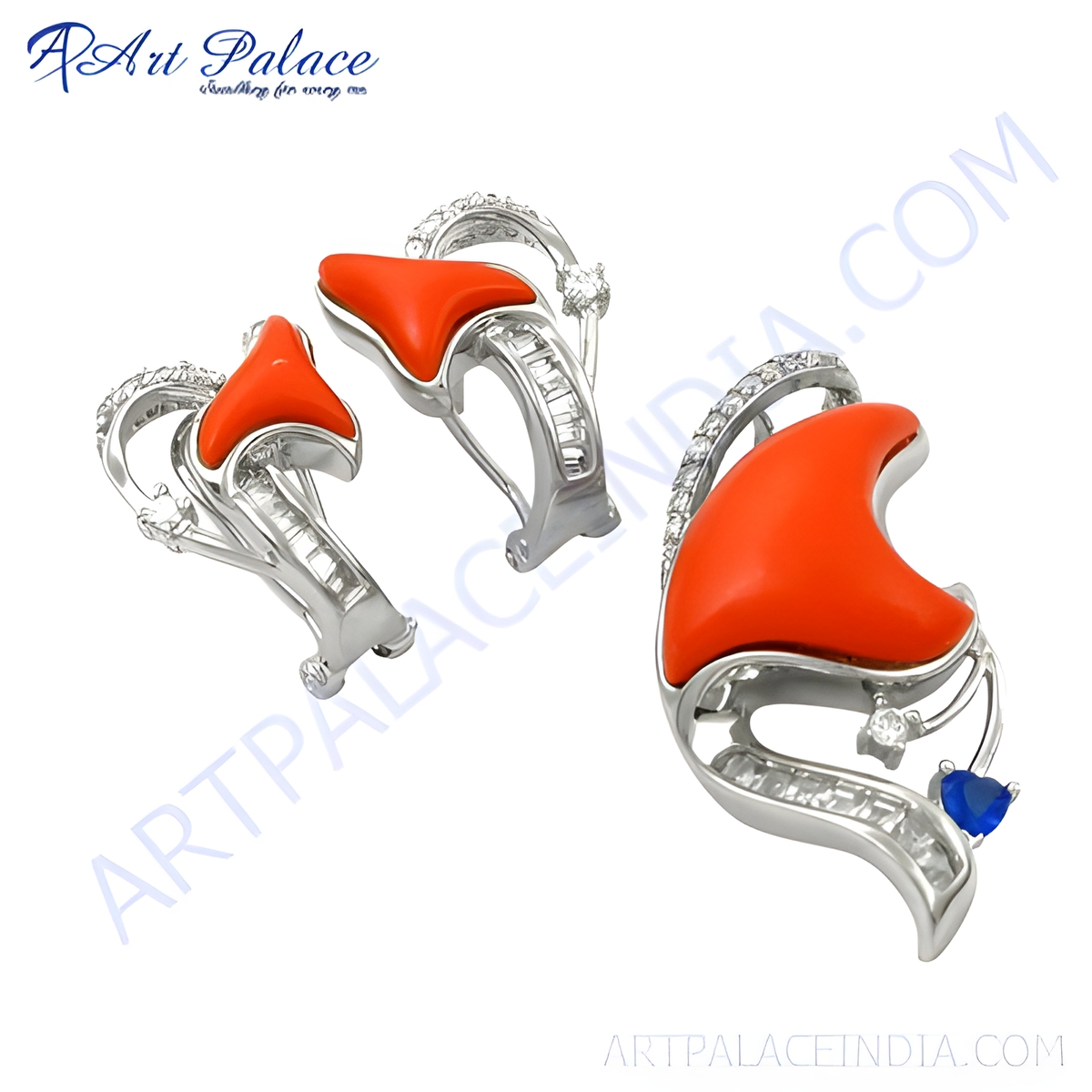 Silver earrings with bright red coral gemstones and sparkling accents, perfect for adding a pop of color and elegance to any outfit