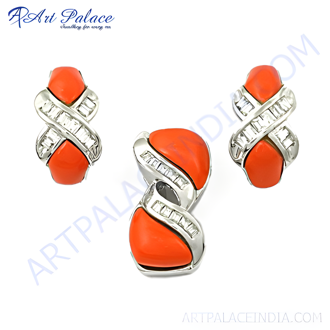 Sterling silver pendant and earrings set with vibrant orange coral and cubic zirconia accents