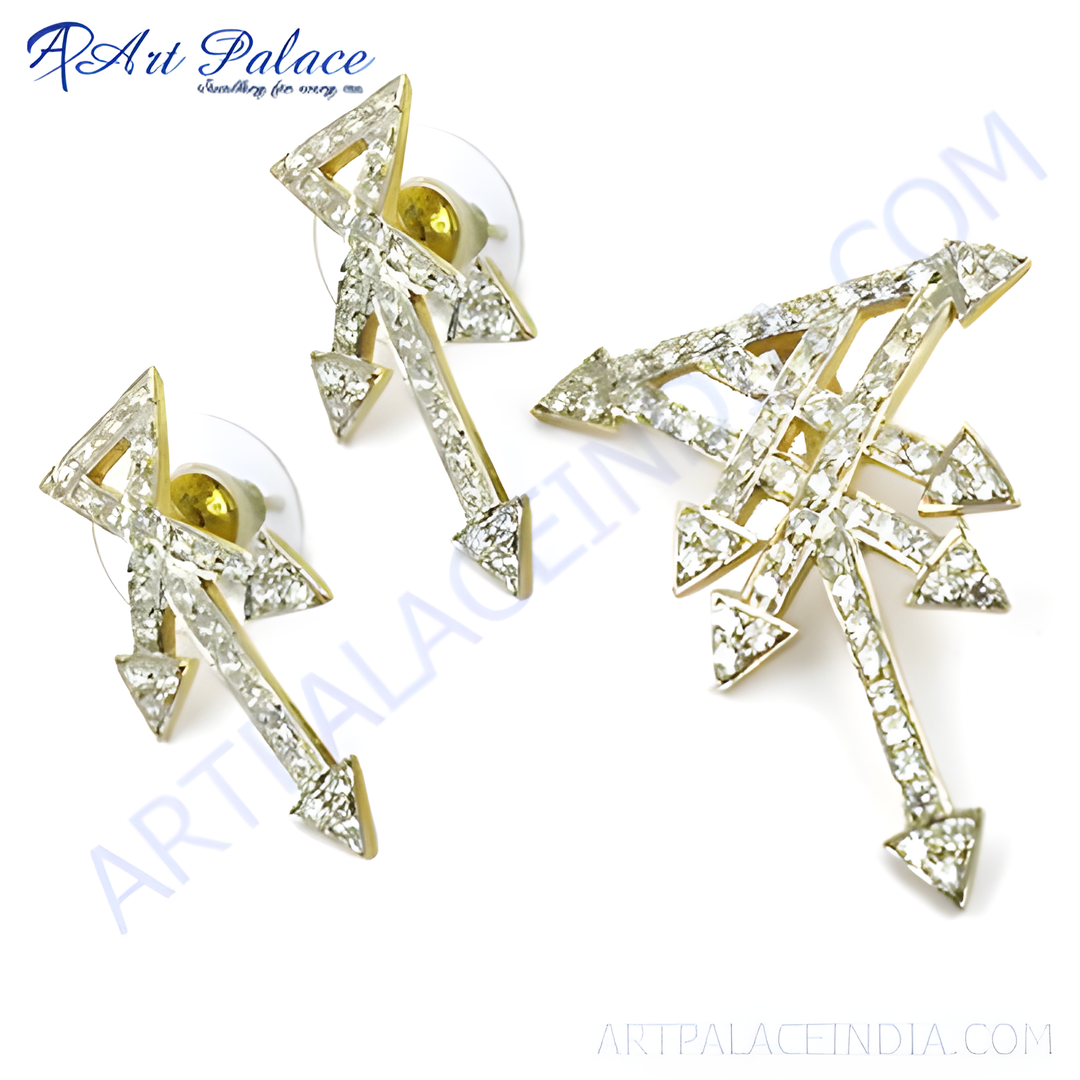gold plating-tone crystal arrow earrings and brooch set, perfect for special occasions. Features sparkling crystal accents.