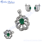 Load image into Gallery viewer, Sterling silver emerald jewelry set featuring a pendant, ring, and earrings with green emerald gemstones.
