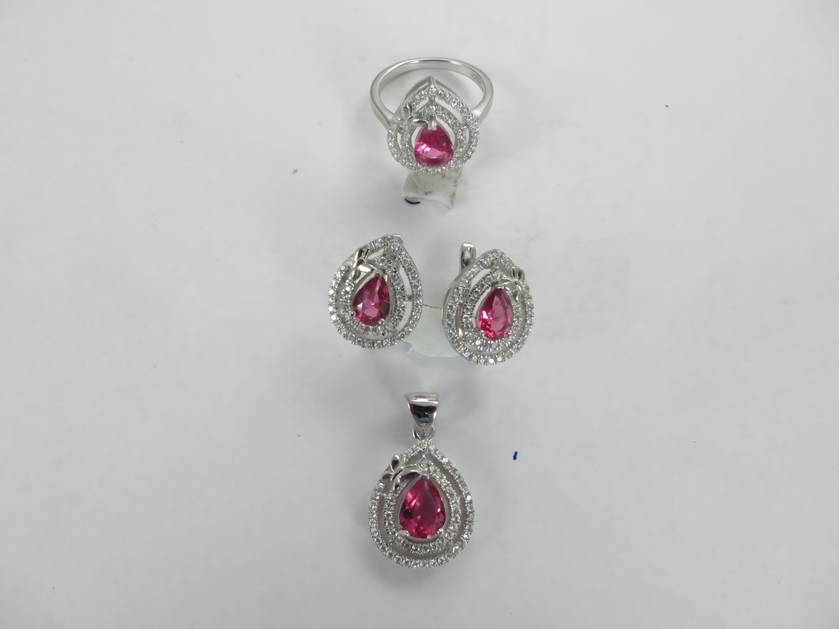 Silver ruby jewelry set, featuring a ring, earrings and pendant with pink gemstones