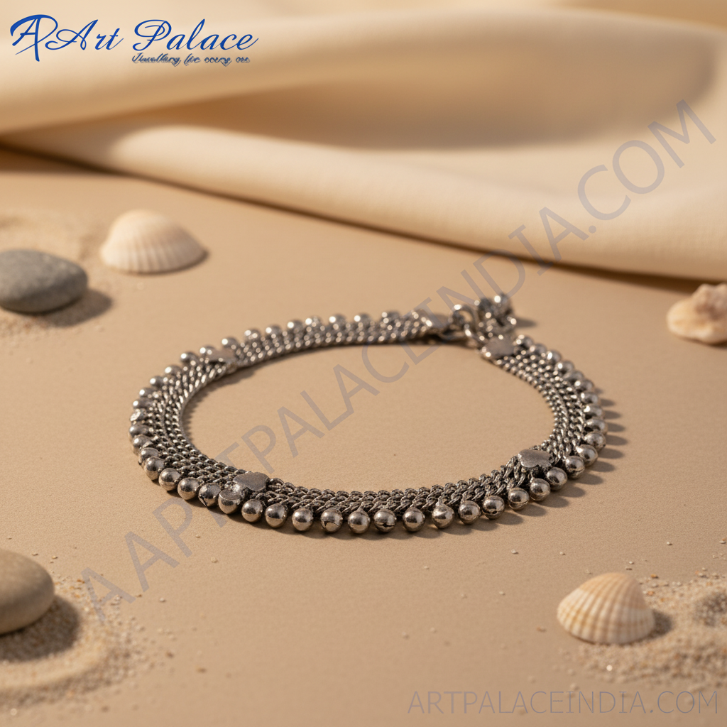 Sterling silver anklet featuring a chain design with dangling bell charms, perfect for daily wear