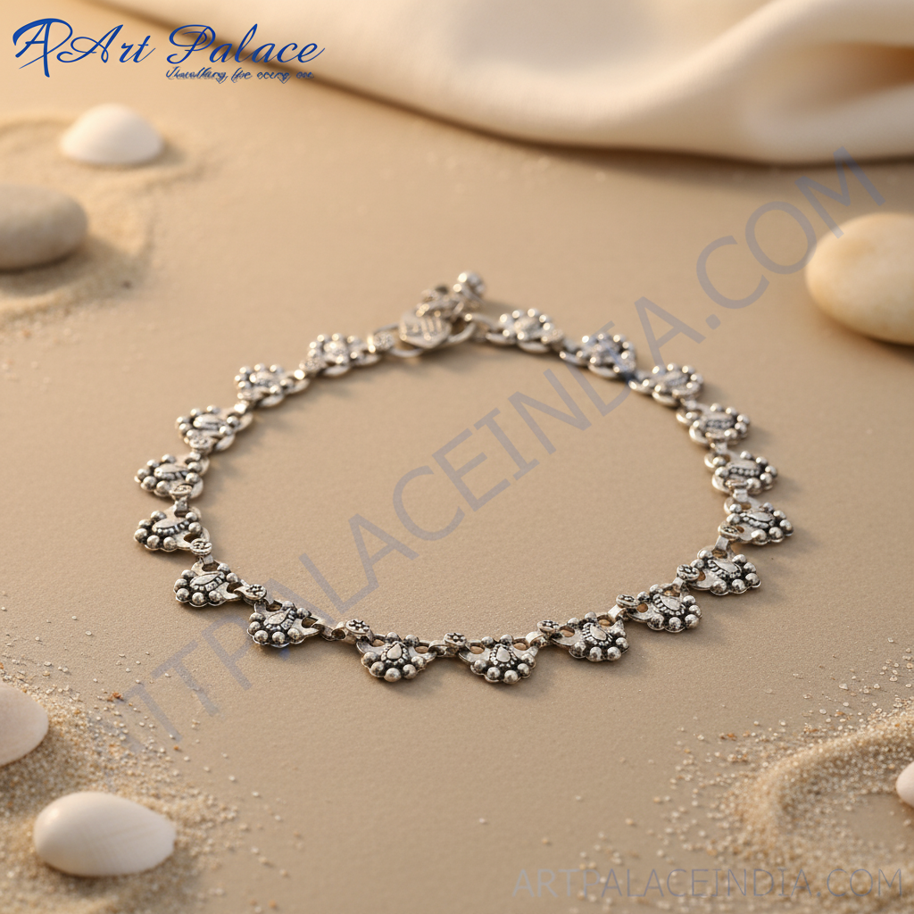 Sterling silver anklet for women with a delicate design.
