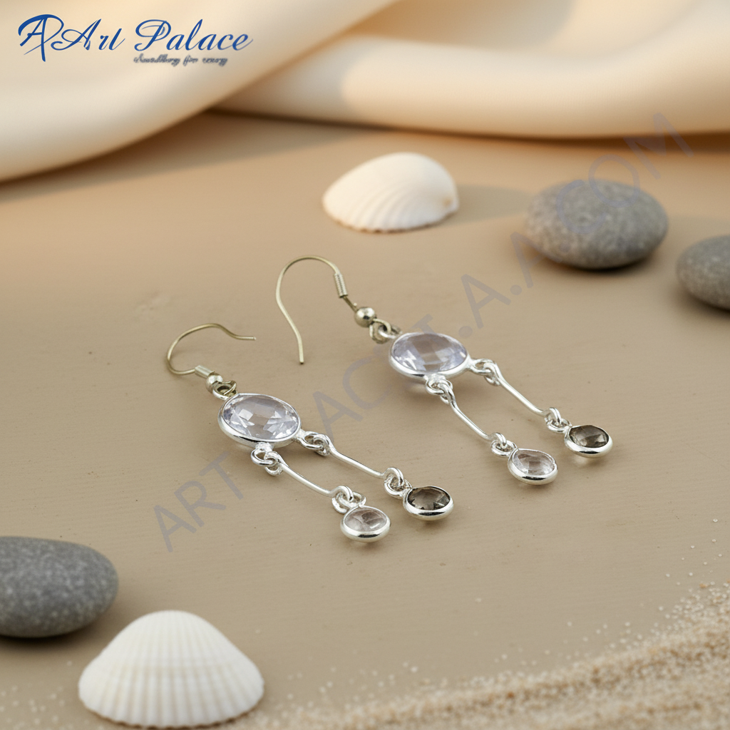Sterling silver dangle earrings with clear and smoky quartz gemstones.