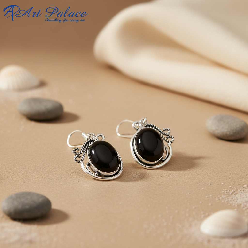925 Sterling silver dangle earrings with oval black onyx gemstones, perfect for any occasion.