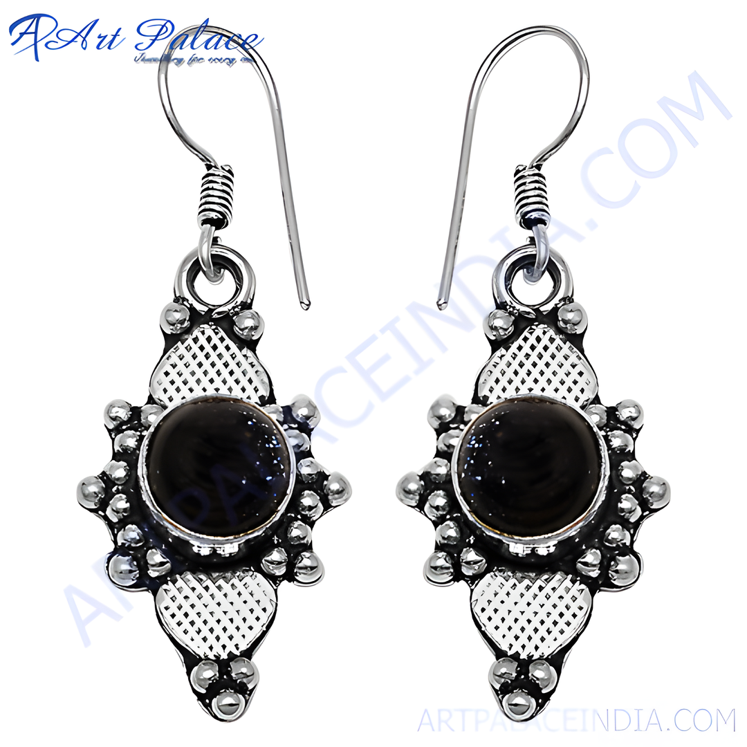 925 sterling silver dangle earrings featuring a round black onyx gemstone set in an ornate design.