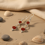 Load image into Gallery viewer, 925 sterling silver drop earrings with oval shaped carnelian gemstones.
