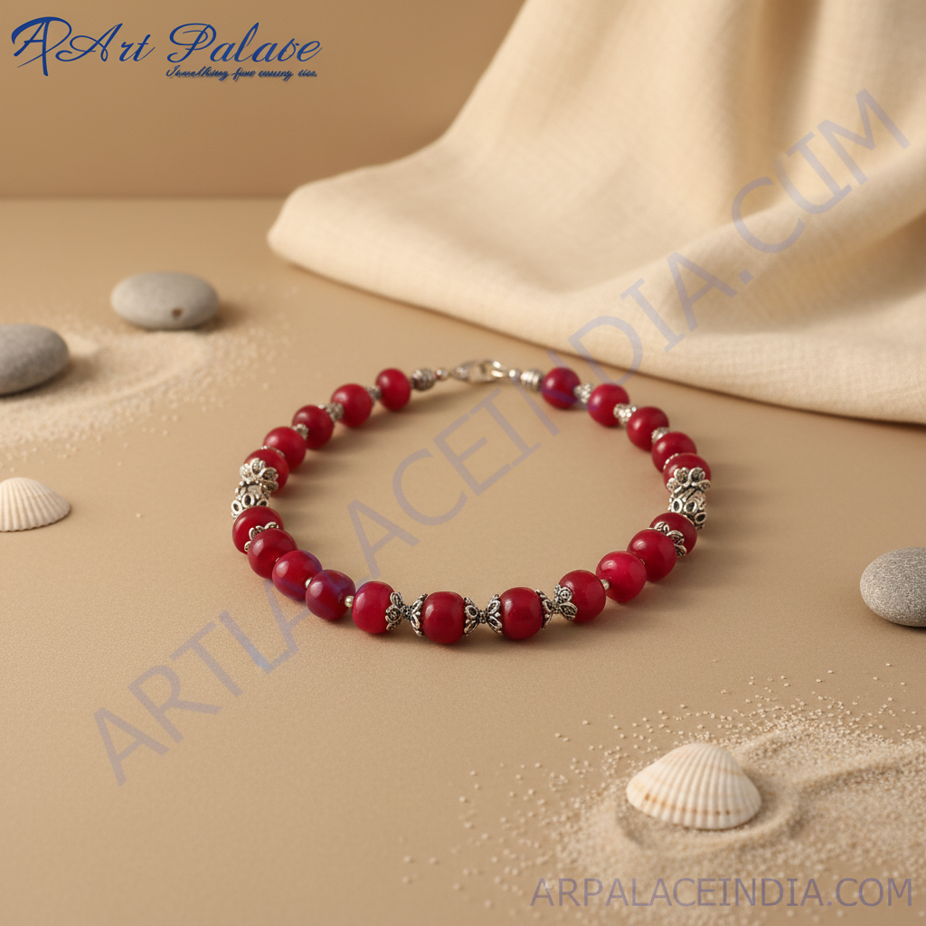 Red beaded necklace on a black jewelry display, showcasing the vibrant red beads and silver accents