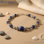 Load image into Gallery viewer, Sterling silver beaded necklace with round blue gemstones and ornate silver beads, perfect for women&#39;s fashion jewelry.
