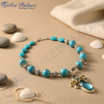 Load image into Gallery viewer, Turquoise bead necklace with silver accents, a statement piece for women.
