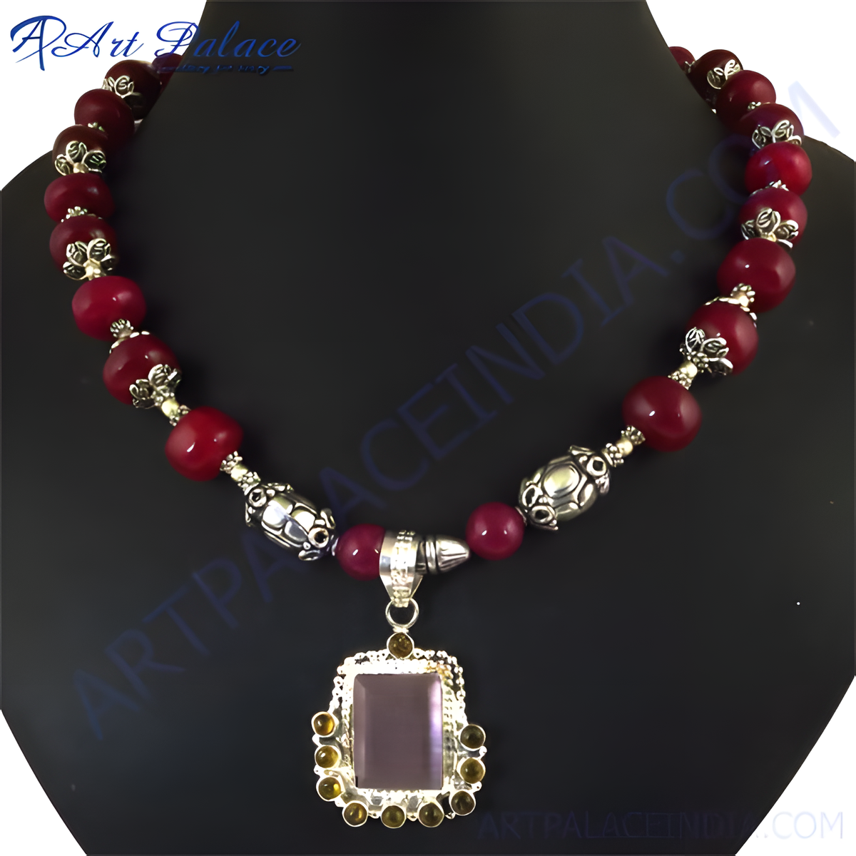 Red agate bead necklace with a silver pendant, featuring a large rectangular gemstone