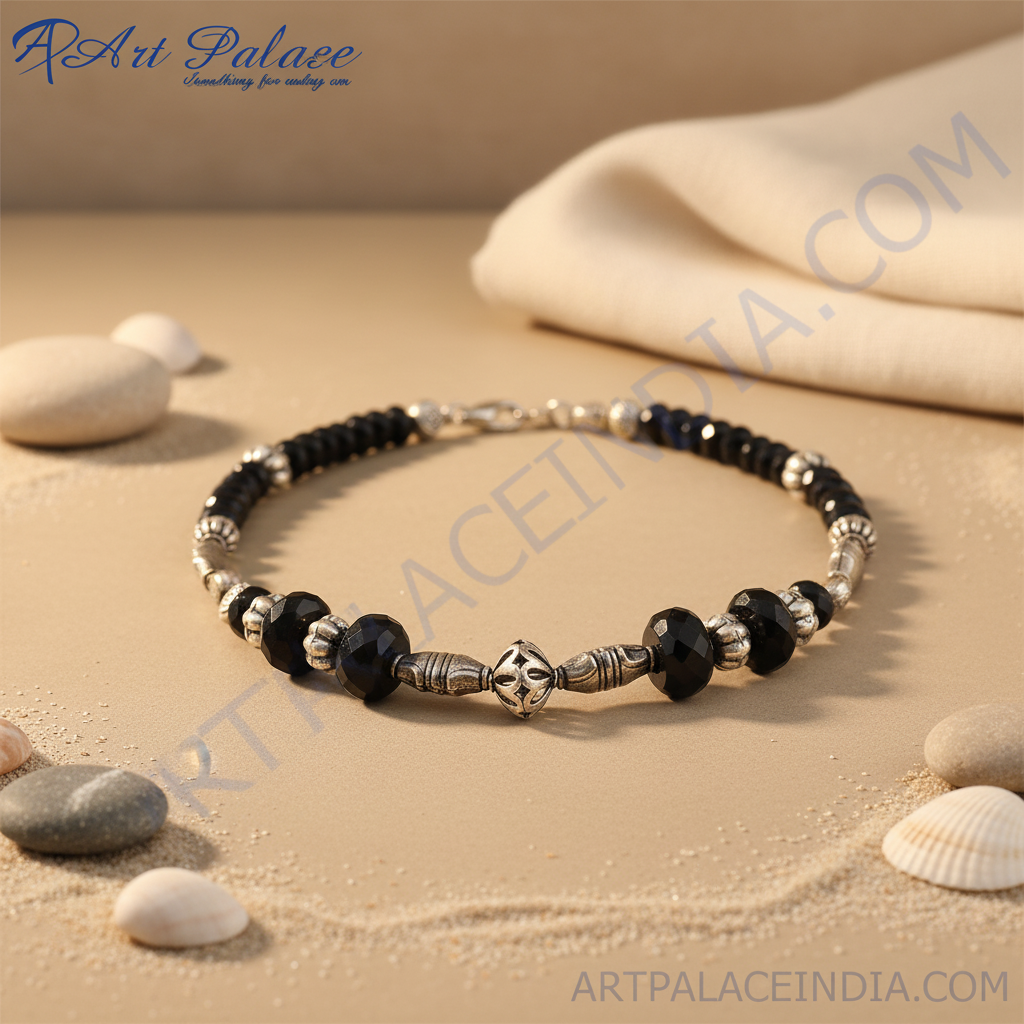 Black onyx beaded necklace with silver accents on a black jewelry display