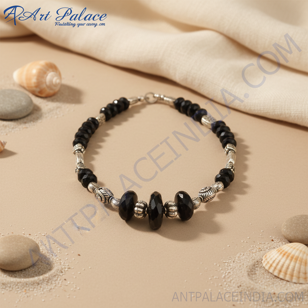 Black onyx bead necklace with sterling silver accents on a black bust