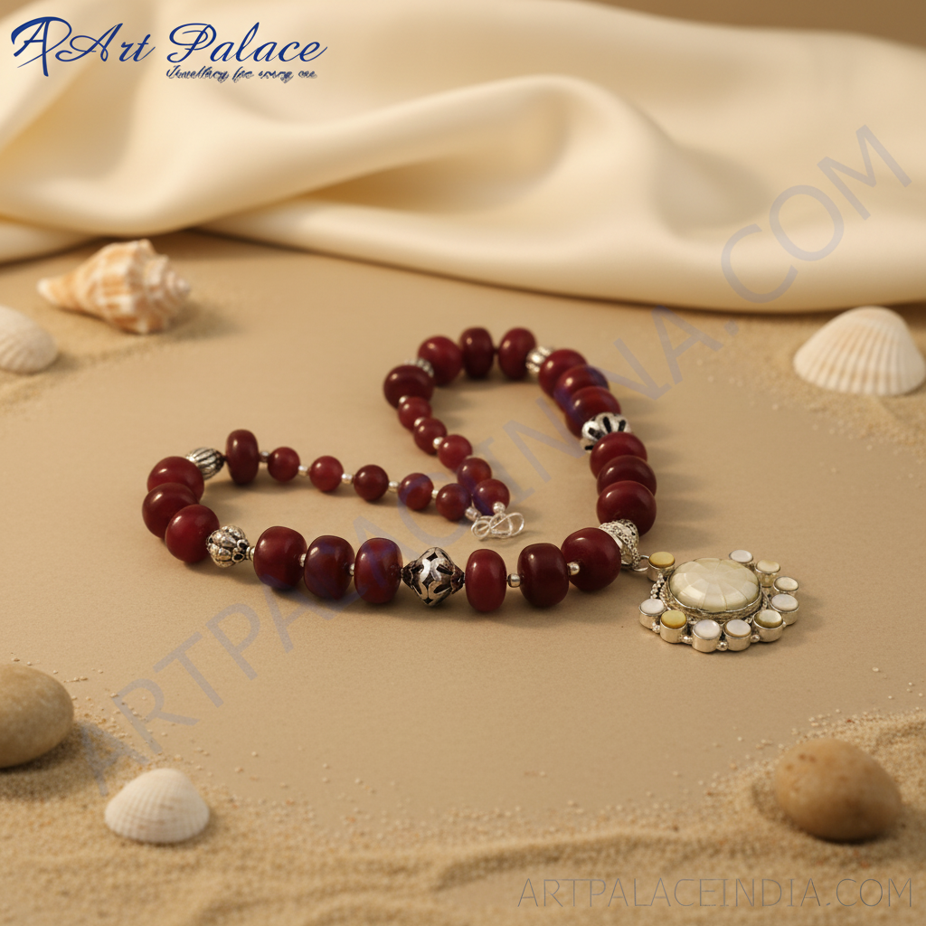 Red stone bead necklace with a silver pendant, perfect for adding a touch of elegance to any outfit