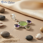 Load image into Gallery viewer, 925 sterling silver cross pendant featuring a green gemstone and amethyst accents
