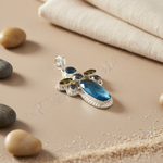 Load image into Gallery viewer, Sterling silver gemstone pendant featuring a large blue topaz and various other stones
