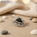 Load image into Gallery viewer, 925 sterling silver black onyx pendant with unique design and intricate details.
